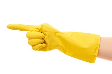 Female hand in yellow protective glove pointing on something