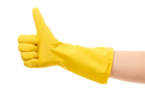 Main féminine en gant de protection jaune montrant les pouces en haut signe — Photo