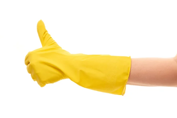 Mão feminina em luva protetora amarela mostrando polegares para cima sinal — Fotografia de Stock