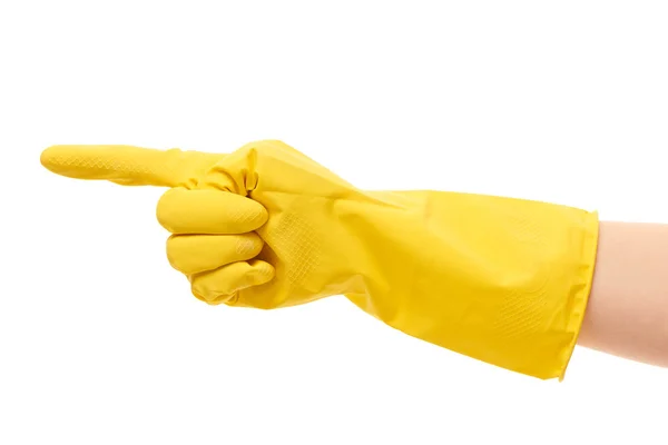 Female hand in yellow protective glove pointing on something — 스톡 사진