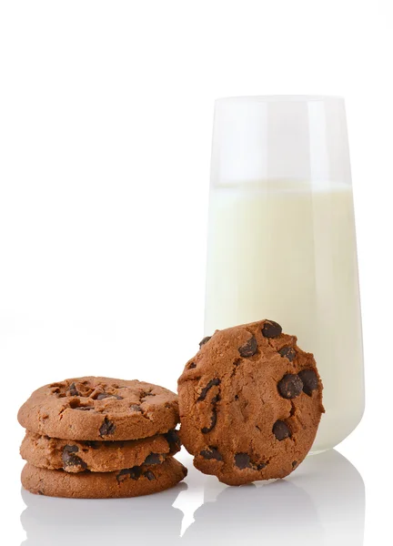 Three homemade chocolate chip cookies, single cookie and glass of milk Stock Photo