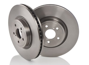 Beyaz arka plan üzerinde izole yeni araba fren diskleri