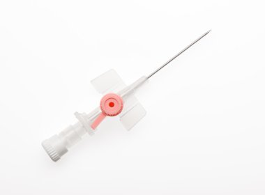 Pembe plastik sonda üzerinde beyaz izole açık iğne ile 