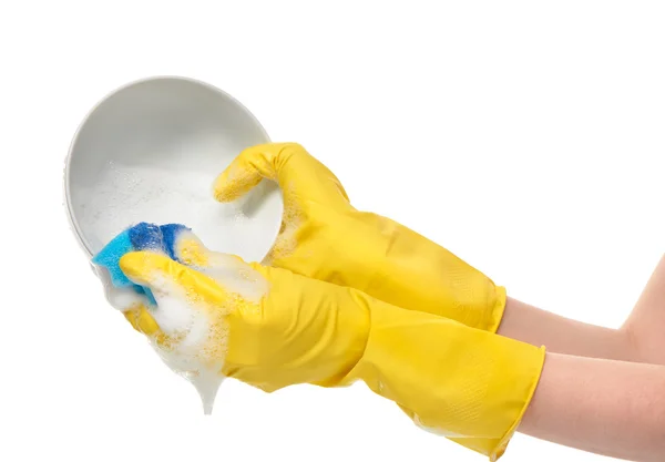 Hands in yellow gloves washing bowl with blue cleaning sponge — Stock Photo, Image