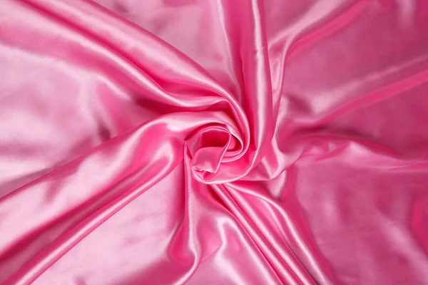 Χρώμα Ροζ Υφασμάτινο Σατέν Ύφασμα Διπλωμένο Πτυχώσεις Και Κύματα Ανταύγειες — Φωτογραφία Αρχείου
