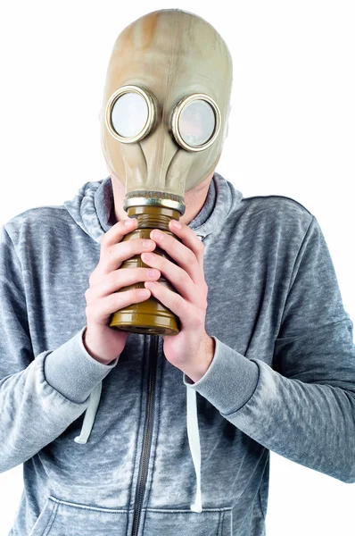 Young man wears a gas mask — Stock Photo, Image