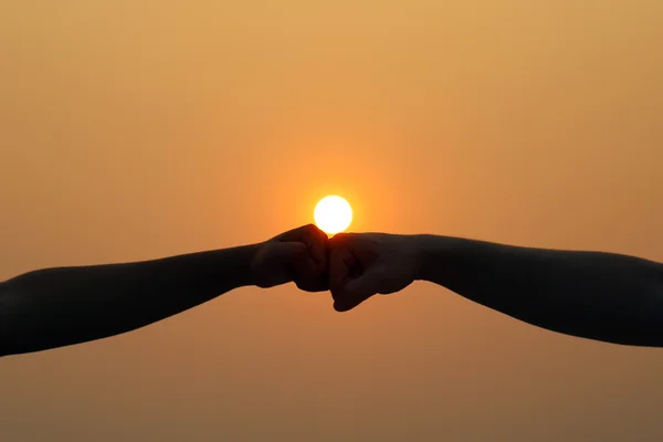 Sunset and hands — Stock Photo, Image