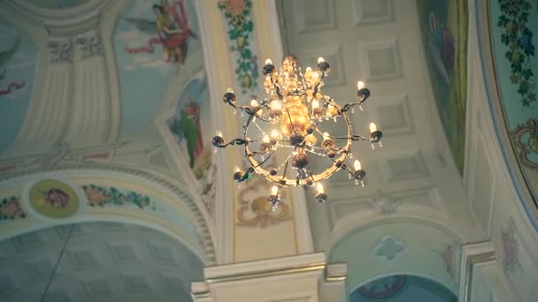 Detail of of the Orthodox Church. Bright dome and chandelier — Stock Video