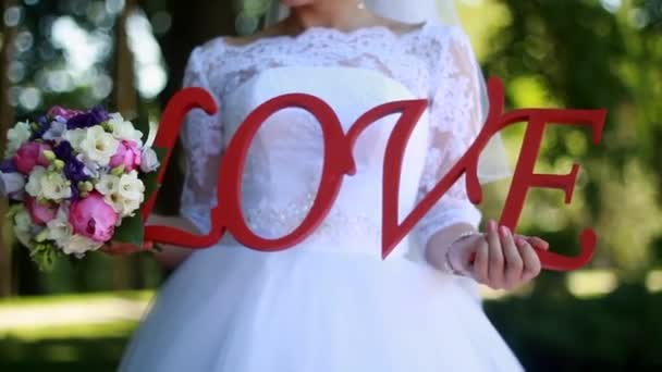 Inschrift Liebe auf der Hochzeit — Stockvideo