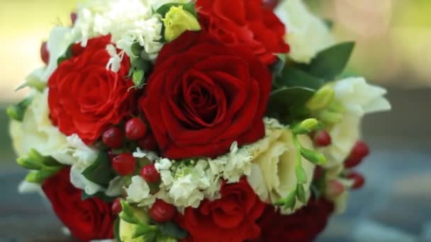 Wedding bouquet in hands of the bride — Stock Video