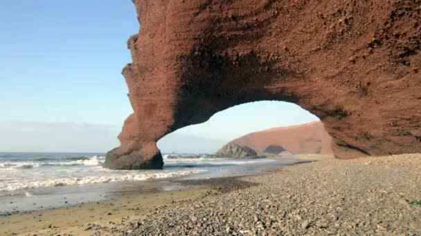 Red archs on atlantic ocean coast near Legzira, Morocco — Stock Video