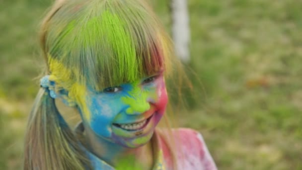 Portrait Of A Cute Girl Painted In The Colors Of Holi Festival
