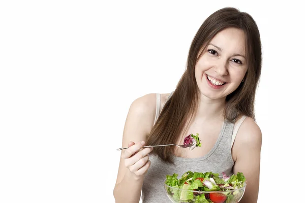 Mulher comendo salada. — Fotografia de Stock