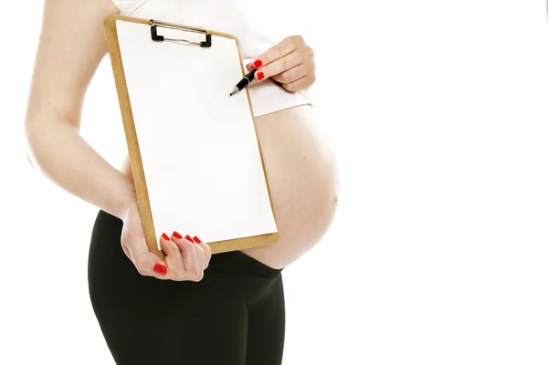 Kobieta w ciąży, Wyświetlono folderu lub tablet z puste — Zdjęcie stockowe