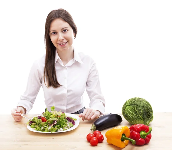 Happy young woman eating salad. — Stock Photo, Image