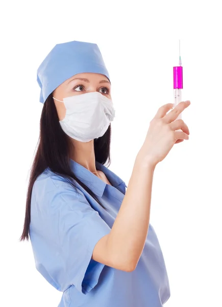 Female doctor holding a syringe in her hand. — Stock Photo, Image