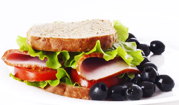 Ham sandwich closeup on the plate. — Stock Photo, Image