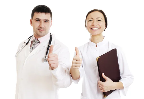 Två läkare manliga och kvinnliga visar ok tecken — Stockfoto