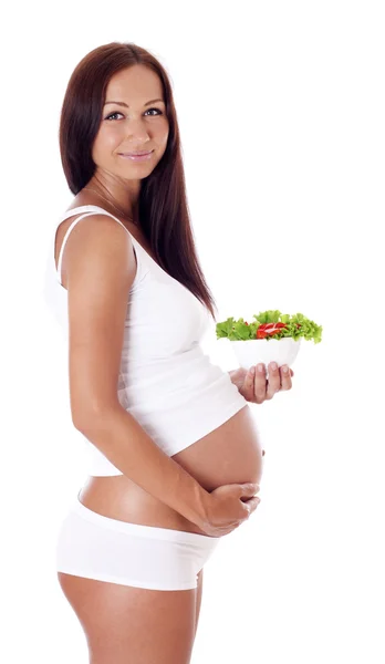 Hamile kadın salata yiyor. — Stok fotoğraf