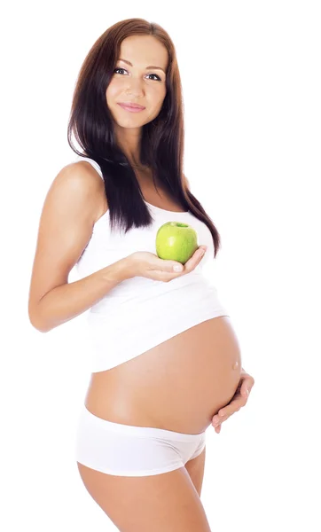 Schwangere mit Apfel. — Stockfoto