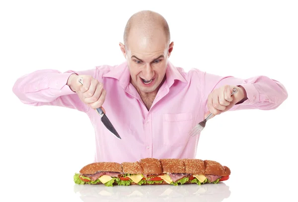 Hombre con sándwich grande. — Foto de Stock