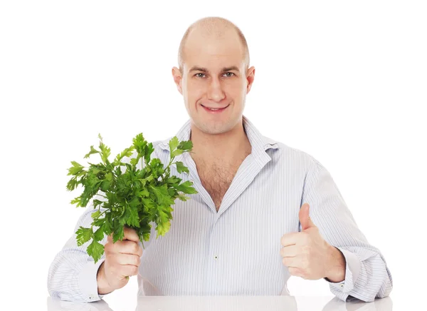 Man with bunch of fresh parsley. — Stock Photo, Image
