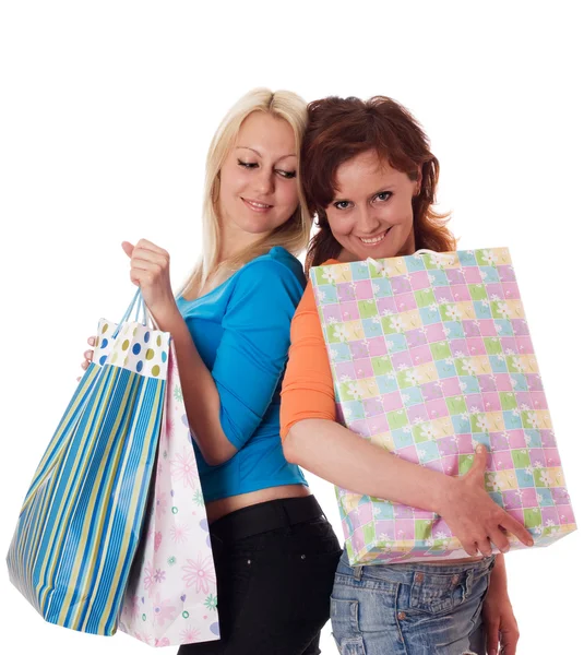 Deux filles heureuses avec des sacs à provisions . — Photo