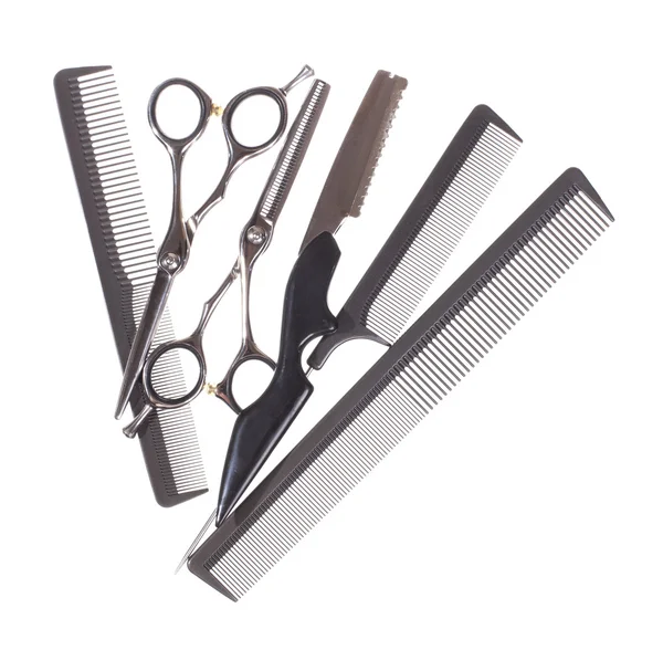 Professionelle Friseurwerkzeuge isoliert auf weiß - Archivbild — Stockfoto