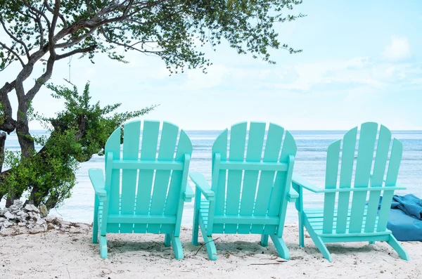 Turquoise beach chairs - Stock image. Royalty Free Stock Photos