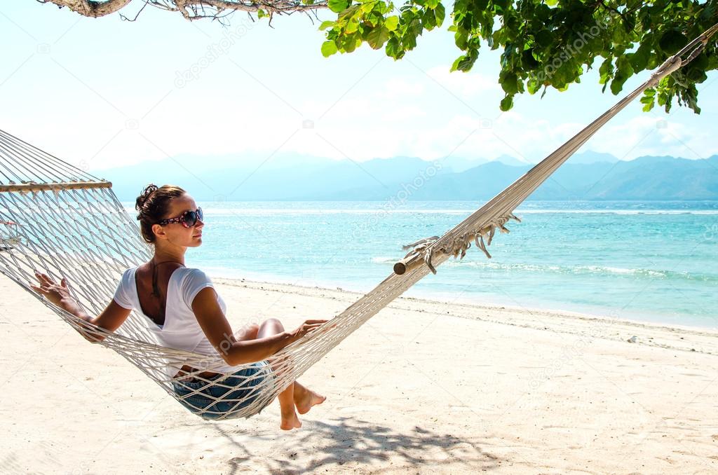 Girl Relaxing In Hammock - Stock image