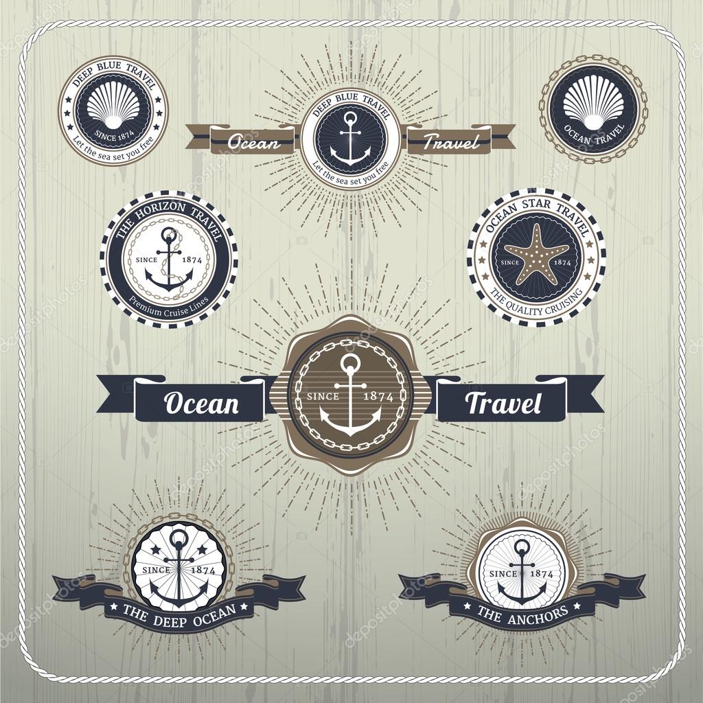Nautical anchor travel labels with ray burst and ribbon on wood background