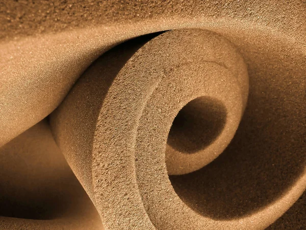 Καφέ Σφουγγάρι Αφρώδες Υλικό Ομαδοποιούνται Σχήμα Σπιράλ — Φωτογραφία Αρχείου