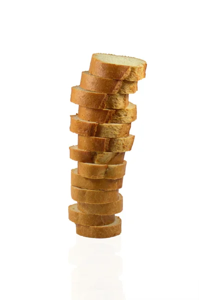 Pan blanco sobre tabla de cortar de madera — Foto de Stock