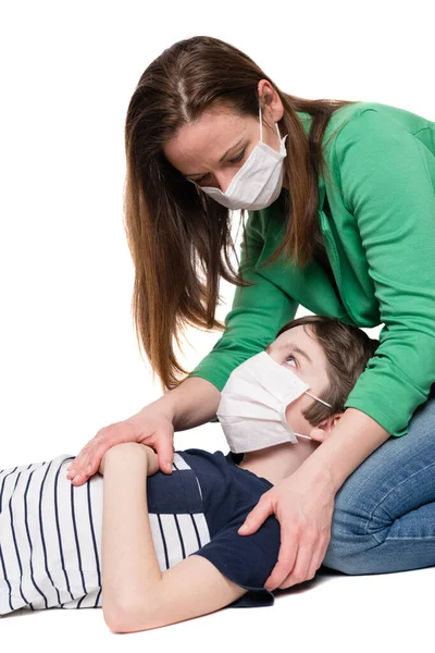 Woman Face Mask Taking Care Sick Little Boy Isolated White — Stock Photo, Image