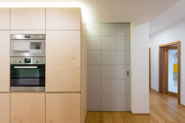 Kitchen separated with living room by sliding door