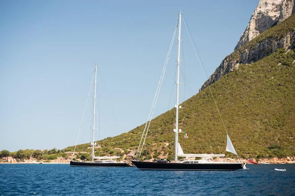 Luxury sport yachts anchored near Tavolara island, Italy
