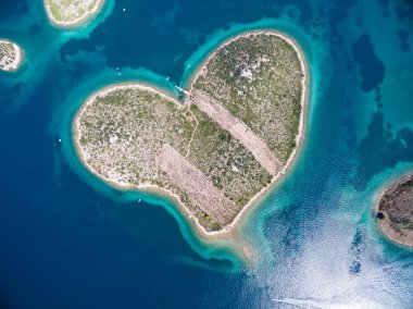 Aerial view of the heart shaped Galesnjak island on the Adriatic coast of Croatia clipart