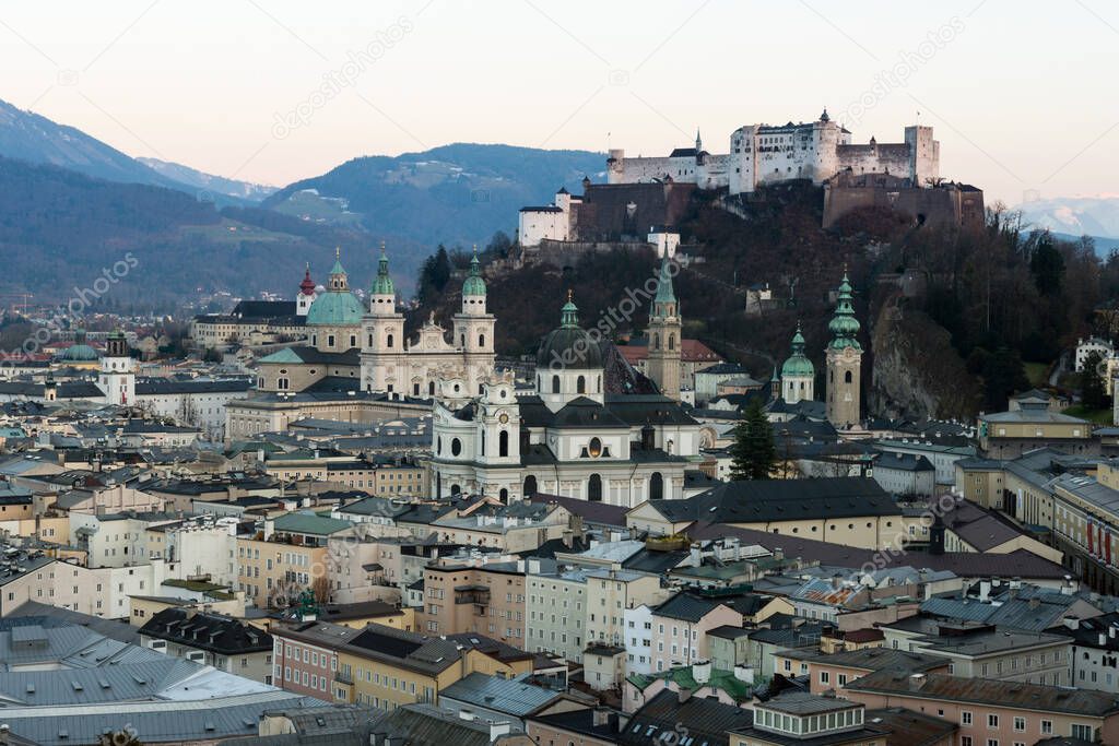 Historic city of Salzburg with Hohensalzburg Fortress at sunset, Austria