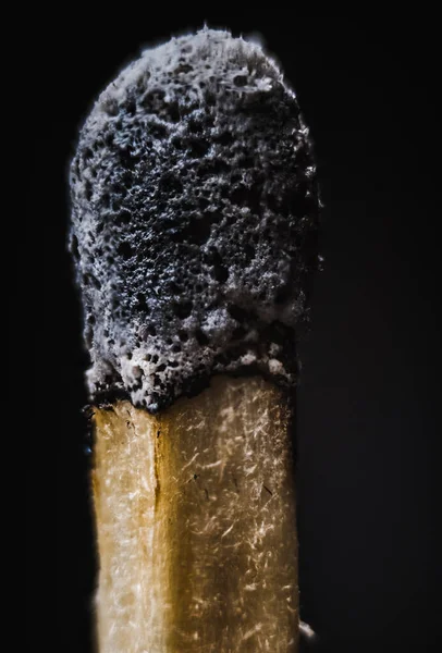 burned match head wooden match burnout without energy concept close up photo isolated match on black background