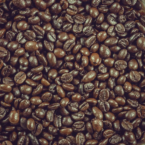 Zbliżenie ziaren kawy na tło i teksturę. — Zdjęcie stockowe
