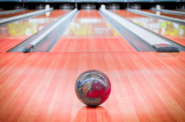 Ball brown on bowling alley. — Stock Photo, Image