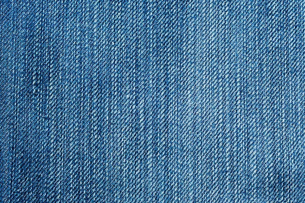 Texture of blue jeans textile close up — Stock Photo, Image