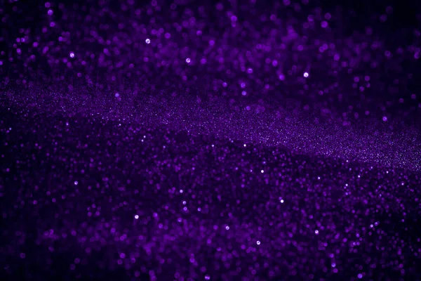 Majestic blue-purple sparkle snow. Cosmic Christmas background for design, cards, posters.