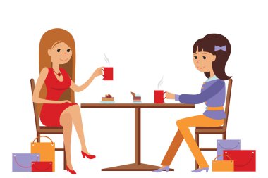 Kahve dükkanında yudumlarken konuşurken iki güzel kadın