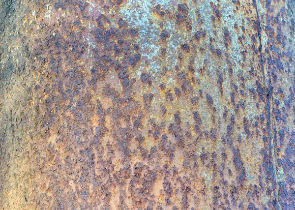 Rusty metal texture for background. red rust on iron texture. Rusty metal texture. Rust texture. Rusty steel. Rusty brown metal sheet with blue, blue and yellow splashes