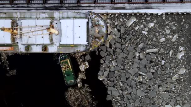 Aerial Top View Pilot Tug Pushes Vessel Pier Winter — Stock Video