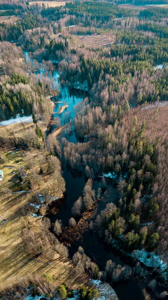 Aerial drone landscape of small river in winter