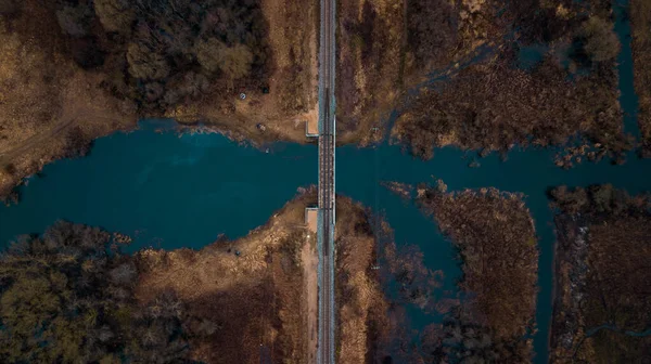 Aerial view of railway bridge over the river
