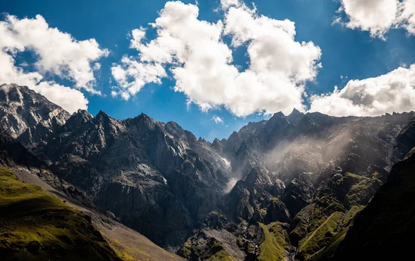 stock image Panorama Of Beautiful Georgian Mountains Landscape. Mount Shani, is the highest mountain of Ingushetia near Stepantsminda Kazbegi on the border with Georgia in Greater Caucasus Range. 