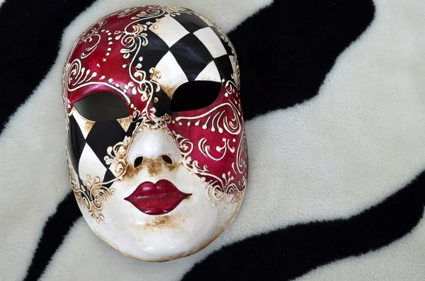 Venetian mask on a black and white background — Stock Photo, Image